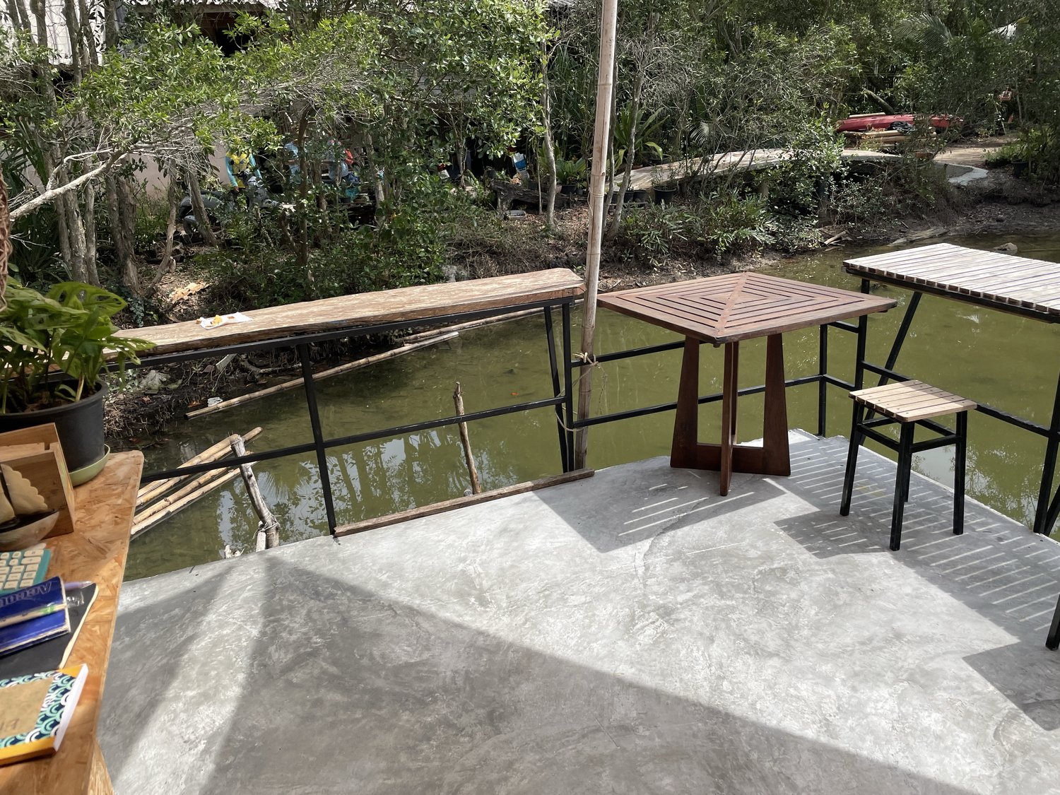 Waterfront deck seating overlooking the canal